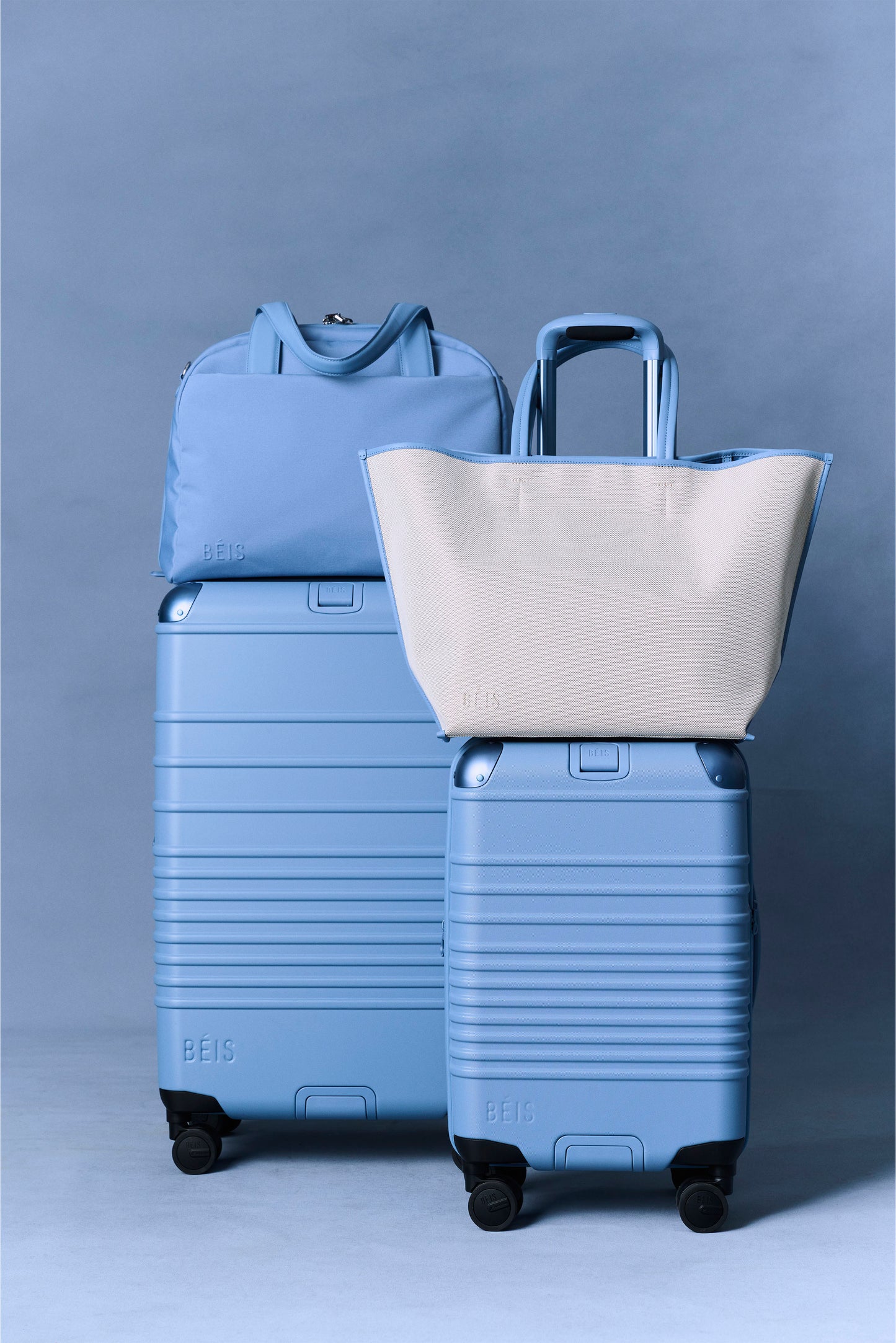 The Hybrid Check-In Roller in Dusty Blue